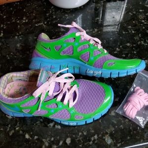 Green and purple nike shoes size 8